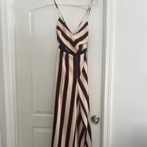 Multi-Color Jumpsuit Romper: Size Small. Perfect for summer, style with sandals